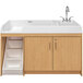 A maple Tot Mate toddler walkup changing table with a right side sink and storage.