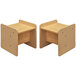 A pair of small wooden activity cubes with beige and maple laminate and small shelves.