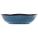 A Tuxton Artisan Night Sky china fruit bowl with a blue surface and speckled edge.