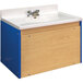 A blue and white Tot Mate floor vanity with a white counter top.