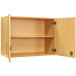 A Tot Mate maple wooden wall cabinet with two shelves and two doors open.