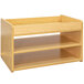 A Tot Mate maple laminate toddler play center with two shelves and a tray.