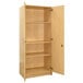 A Tot Mate maple tall cabinet with two doors open.