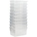 A stack of clear plastic Tot Mate mini bins.