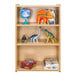 A Tot Mate maple laminate school age storage shelf with toys, books, and puzzle boxes on it.