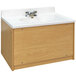 A wooden cabinet with a Tot Mate maple laminate vanity with a white sink.