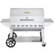 A Crown Verity natural gas grill with wheels on it.