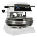 A white and black Proluxe Endurance Pro X2M dough press with a metal plate.