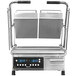 A Proluxe Vantage split lid panini grill with smooth plates on a professional kitchen counter.