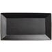 A black rectangular stoneware platter with a white background.