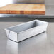 A Chicago Metallic aluminized steel bread loaf pan on a counter.