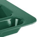 A Sherwood green Cambro compartment tray with 6 compartments.