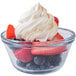 A bowl of fruit with Rich's Sugar-Free Whipped Dessert Topping.