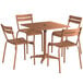 A Lancaster Table & Seating outdoor dining table and chairs set with an umbrella hole.