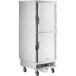 A ServIt stainless steel holding and proofing cabinet with solid doors on wheels.