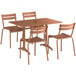 A Lancaster Table & Seating brown aluminum outdoor dining table with chairs.