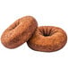 Two brown Rich's plain cake donuts on a white background.