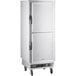 A ServIt full size insulated holding cabinet with two solid doors on wheels.