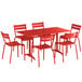 A Lancaster Table & Seating red powder-coated aluminum dining set with a table and 6 chairs.