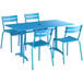 A blue Lancaster Table & Seating outdoor dining set with four chairs on a blue table.