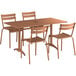 A brown Lancaster Table & Seating dining height outdoor table with four chairs.