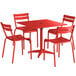A red Lancaster Table and Seating outdoor dining table with chairs.
