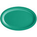 A green oval platter with a white border.