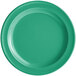 An Acopa Foundations green melamine plate with a white narrow rim.