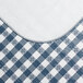 A navy blue and white checkered vinyl table cover with a flannel back.
