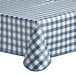 A navy blue and white checkered vinyl table cover on a table.