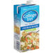 A blue and white carton of College Inn Less Sodium Chicken Broth.