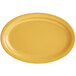 A yellow oval platter with a black border.