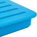 A close-up of a blue plastic container.