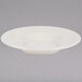 A white Tuxton Hampshire china pasta bowl with an embossed rim.