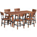 A Lancaster Table & Seating solid wood dining table with 6 chairs.