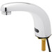 A chrome Equip by T&amp;S hands-free sensor faucet with a black hose and gold handle.