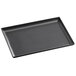 A black rectangular Vollrath tip tray.
