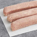 Warrington Farm Meats Country Chicken Sausage Links on a white surface.
