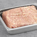 Warrington Farm Meats loose country chicken sausage in a metal tray.