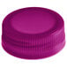 A close-up of a violet tamper-evident cap on a white background.