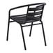A Lancaster Table & Seating black metal arm chair with a black seat.