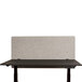 A black Luxor desk with a grey RECLAIM privacy panel.