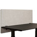 A Luxor desk with a grey privacy panel.
