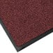 A red Lavex carpet mat with a black border.