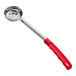 A red stainless steel perforated portion spoon with a handle.