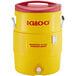 An Igloo yellow and red insulated beverage dispenser with a lid.