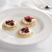 A plate of Bemka Traditional Russian Blini with caviar and cream served as an appetizer.