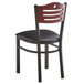 A Lancaster Table & Seating black bistro chair with a black vinyl cushion and mahogany wood back.