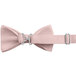 A close-up of a Henry Segal light pink poly-satin bow tie with an adjustable band and silver buckle.