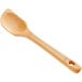 An OXO wooden corner spoon with a handle.